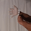 DISPOSITIF DINSTALLATION DE GANTS A.BERECZKY