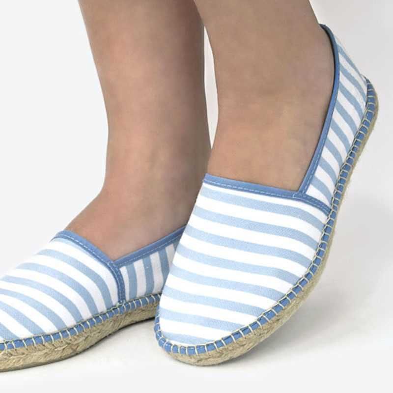 Blue and white striped espadrilles, made with 100% natural cotton.